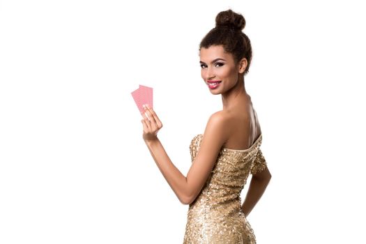 Pretty african girl shows two cards in casino poker and win Young woman in studio on white background