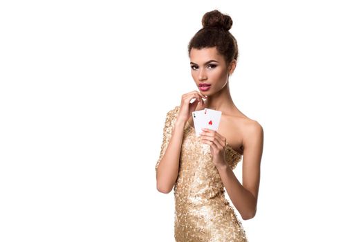 Pretty african girl shows two aces in casino poker and win Young woman in studio on white background