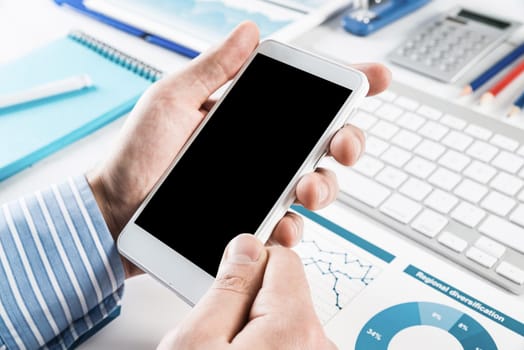 close-up of men's hands with a phone. Office work