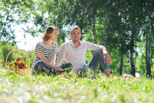 Couple at a picnic in the park. Spending time with a loved one