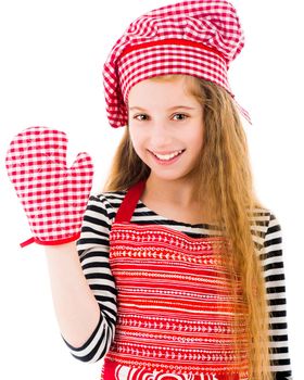 Little positive girl in red apron and red baking glove waving isolated on white background