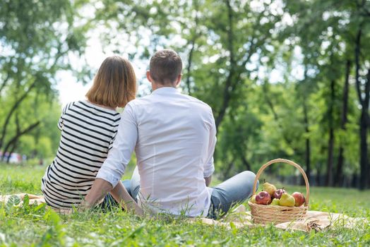 Couple at a picnic in the park. Spending time with a loved one