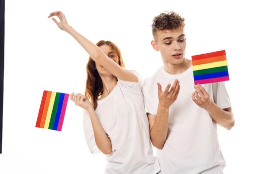 young couple lgbt Flag transgender lifestyle light background. High quality photo