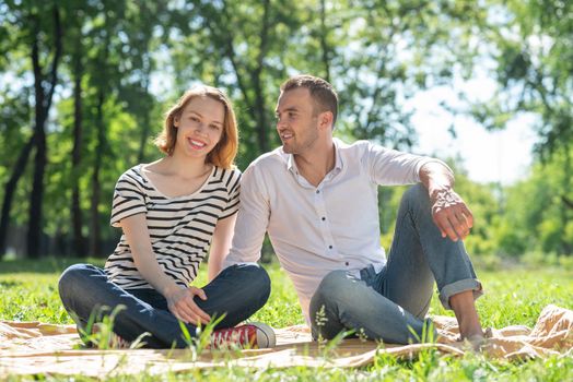 Couple at a picnic in the park. Spending time with a loved one