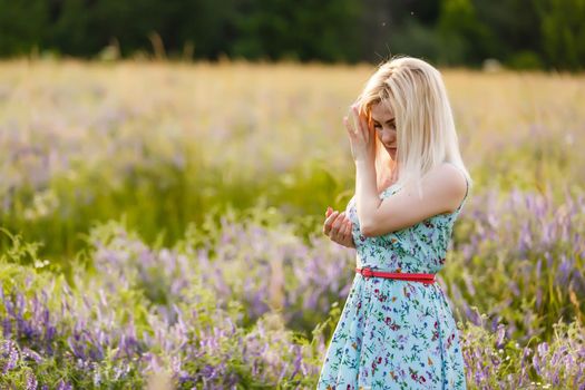 Bright Portrait of Happy Woman at Summer Field