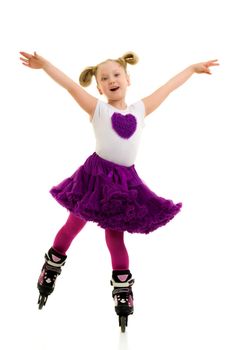 Cute little girl fun rollerblading. The concept of a healthy lifestyle, advertising. Isolated on white background.