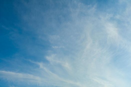 White Spindrift clouds on blue beauty sky - image