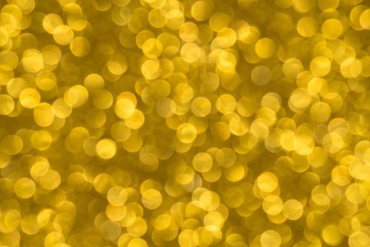 Abstract christmas lights glitter background. christmas gold texture background.