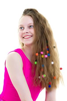 Girl gymnast school age with long silky hair in which scattered multi-colored confetti. The concept of sport and fashion. Isolated on white background.