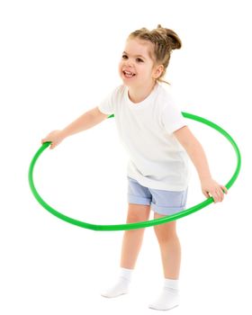 Beautiful little girl in a pure white T-shirt, on which you can write a logo or any other text that plays with a hoop. The concept of advertising, children's sports. Isolated on white background