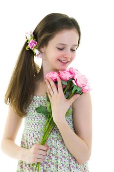 Little girl with a beautiful bouquet of flowers. The concept of holidays, family and children. Isolated on white background.