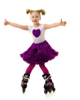 Cute little girl fun rollerblading. The concept of a healthy lifestyle, advertising. Isolated on white background.