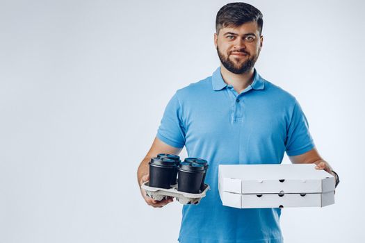 Food delivery courier with order on light grey background
