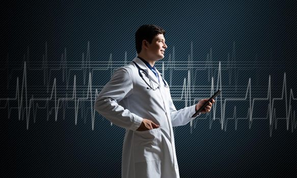Doctor with tablet works with digital technologies