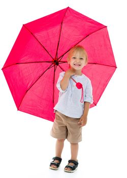 A cute little boy took refuge under an umbrella. Concept game, happy childhood. Isolated on white background