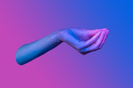 Hand in a pop art collage style in neon bold colors. Modern psychedelic creative element with human palm for posters, banners, wallpaper. Copy space for text. Magazine style design. Zine culture.