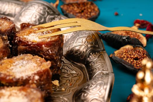 Turkish arabic desserts baklava on silver plate close up