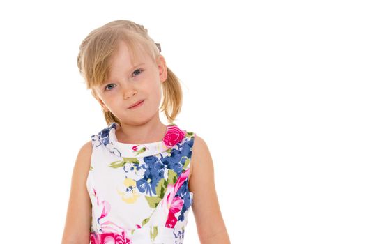 Beautiful little girl posing in the studio. Children's emotions concept. Close-up. Isolated on white background.