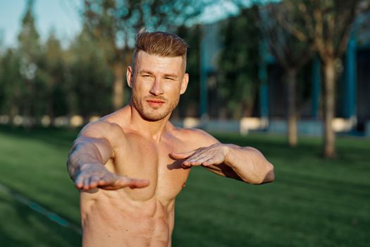 man in the park workout outdoor exercise. High quality photo