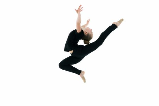 Girl gymnast performs a jump. The concept of fitness, gymnastics, sports. Isolated on white background.