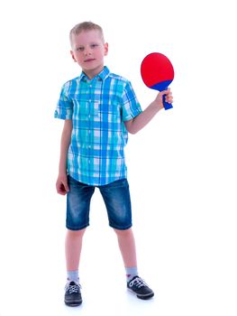 Cute little boy with a ping pong racket. The concept of children's sports. Isolated on white background.