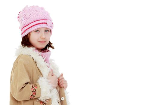 Beautiful little girl posing in the studio. Children's emotions concept. Close-up. Isolated on white background.