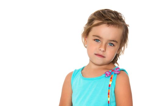 Beautiful little girl posing in the studio. Children's emotions concept. Close-up. Isolated on white background.