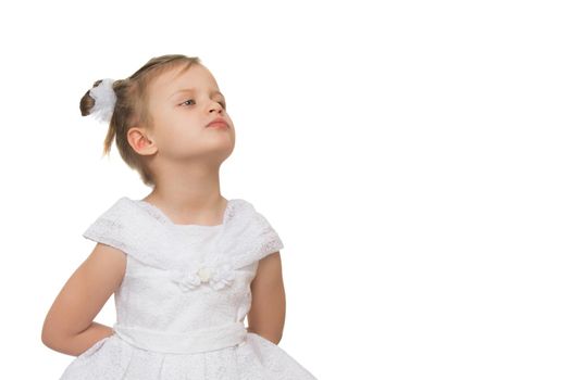 Beautiful little girl posing in the studio. Children's emotions concept. Close-up. Isolated on white background.