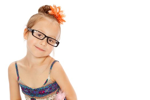 Beautiful little girl posing in the studio. Children's emotions concept. Close-up. Isolated on white background.