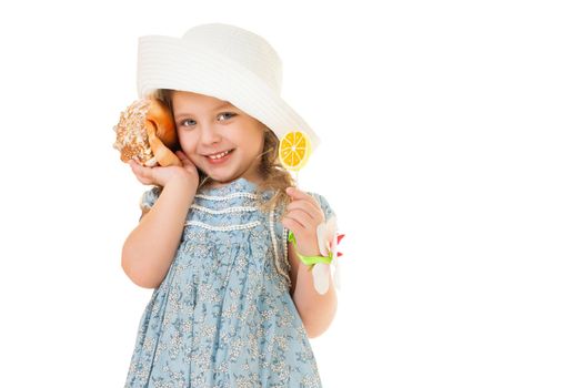 A little girl with a sea shell. The concept of a family vacation at sea, ecology. Isolated on white background.