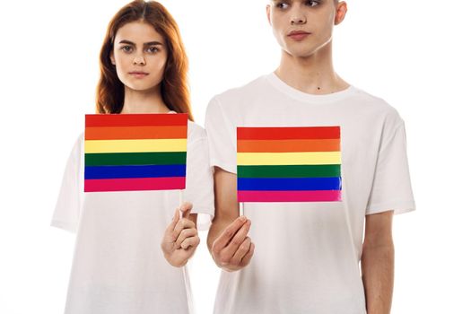 couple in white t-shirts Flag lgbt transgender sexual minorities. High quality photo