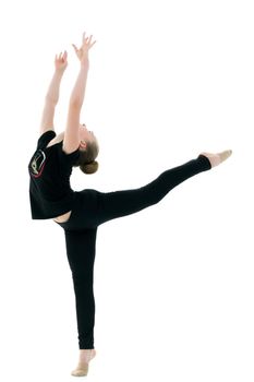 little girl gymnast performs an exercise. Balance on one leg with a grip. Sport concept, gymnastics, fitness. Isolated on white background.