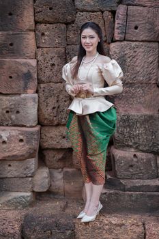 happy beautiful woman in Thai traditional dress 