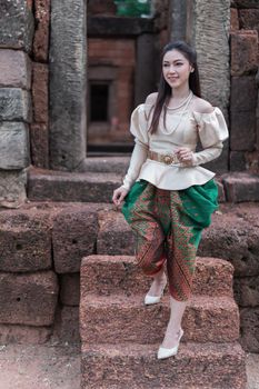 happy beautiful woman in Thai traditional dress 