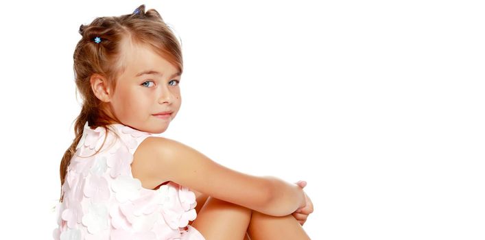 Beautiful little girl close-up. The concept of beauty and fashion, happy childhood. Isolated on white background.