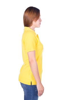woman in yellow polo shirt isolated on a white background (side view)