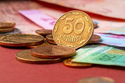 Ukrainian money. Denomination of new and withdrawal of old coins and banknotes concept. High quality photo