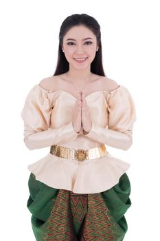 happy woman in Thai traditional dress is pay respect isolated on white background