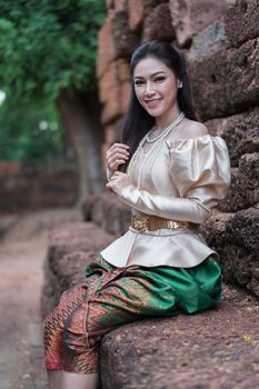 happy beautiful woman in Thai traditional dress 
