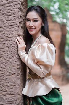 happy beautiful woman in Thai traditional dress 