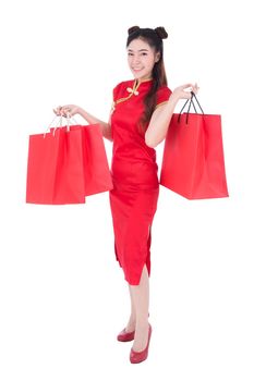 happy woman holding shopping bag on chinese new year celebration isolated on white background