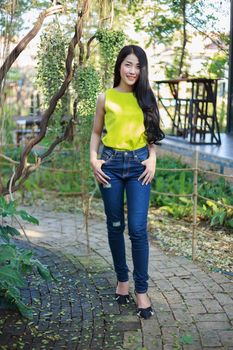 portrait of beautiful asian woman in the garden