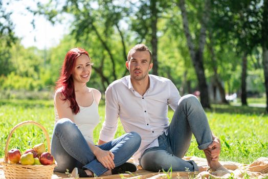 Couple at a picnic in the park. Spending time with a loved one