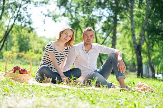 Couple at a picnic in the park. Spending time with a loved one