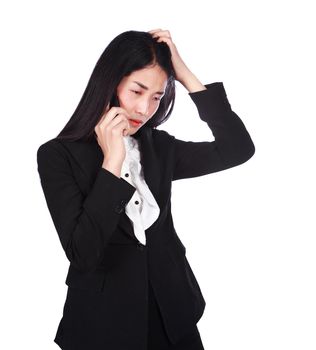 young woman in business suit working in stress desperate talking on a mobile phone