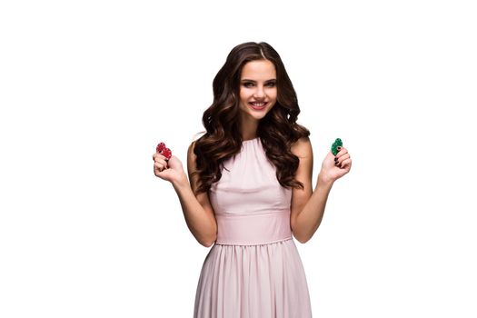 Sexy curly hair brunette posing with chips in her hands, poker concept isolation on white background Casino, poker, Roulette Blackjack Spin. Big win emotions