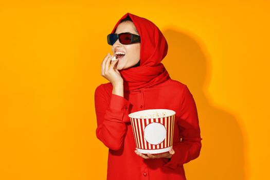 Muslim virtual reality movie fashion fun movie yellow background. High quality photo