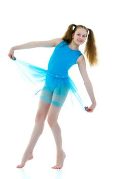 A gymnast girl prepares for the exercise. The concept of childhood and sport, a healthy lifestyle. Isolated on white background.