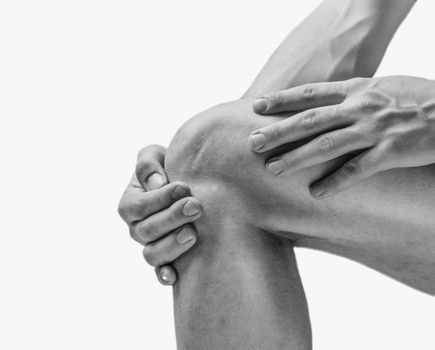 Pain in the knee joint. Monochrome image, isolated on a white background