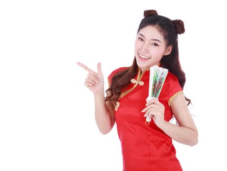 woman wearing chinese cheongsam dress and holding a chinese fan isolated on a white background